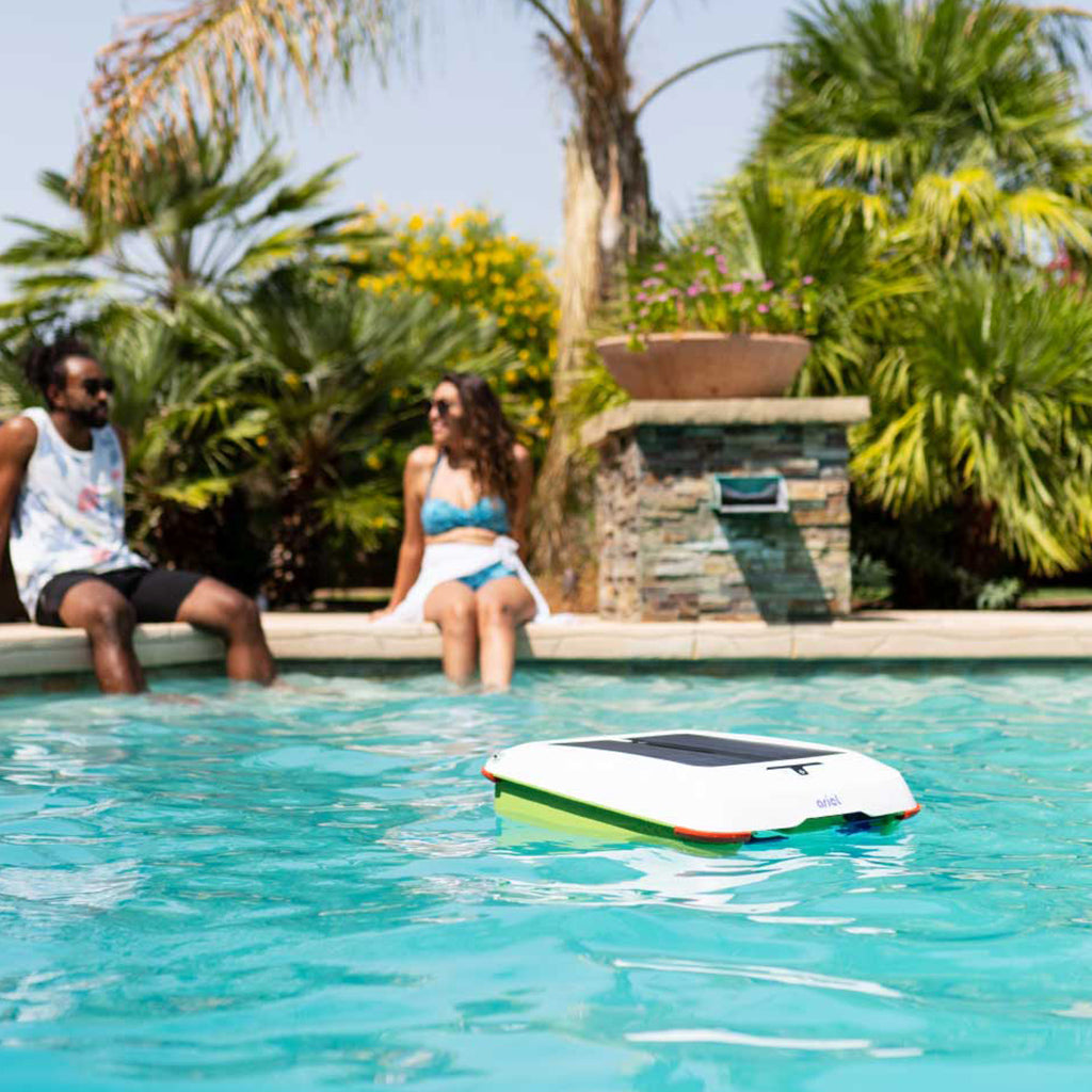 Solar powered robotic pool cleaner in swimming pool