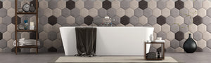 Black and gray hexagon tile on bathroom wall