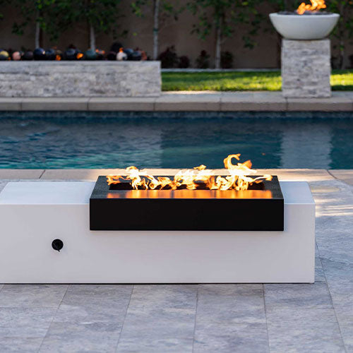 Black and white fire pit table in outdoor living space