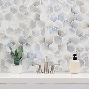 White and light blue hexagon glass tile on bathroom vanity wall