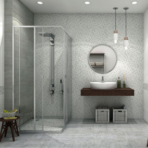 White and gray glass mosaic tile in a bathroom shower and on a vanity wall