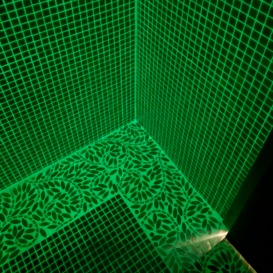 Glow in the dark grout on shower floor and shower wall