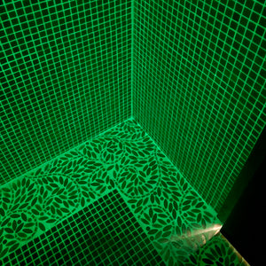 Glow in the dark grout on shower floor and shower wall