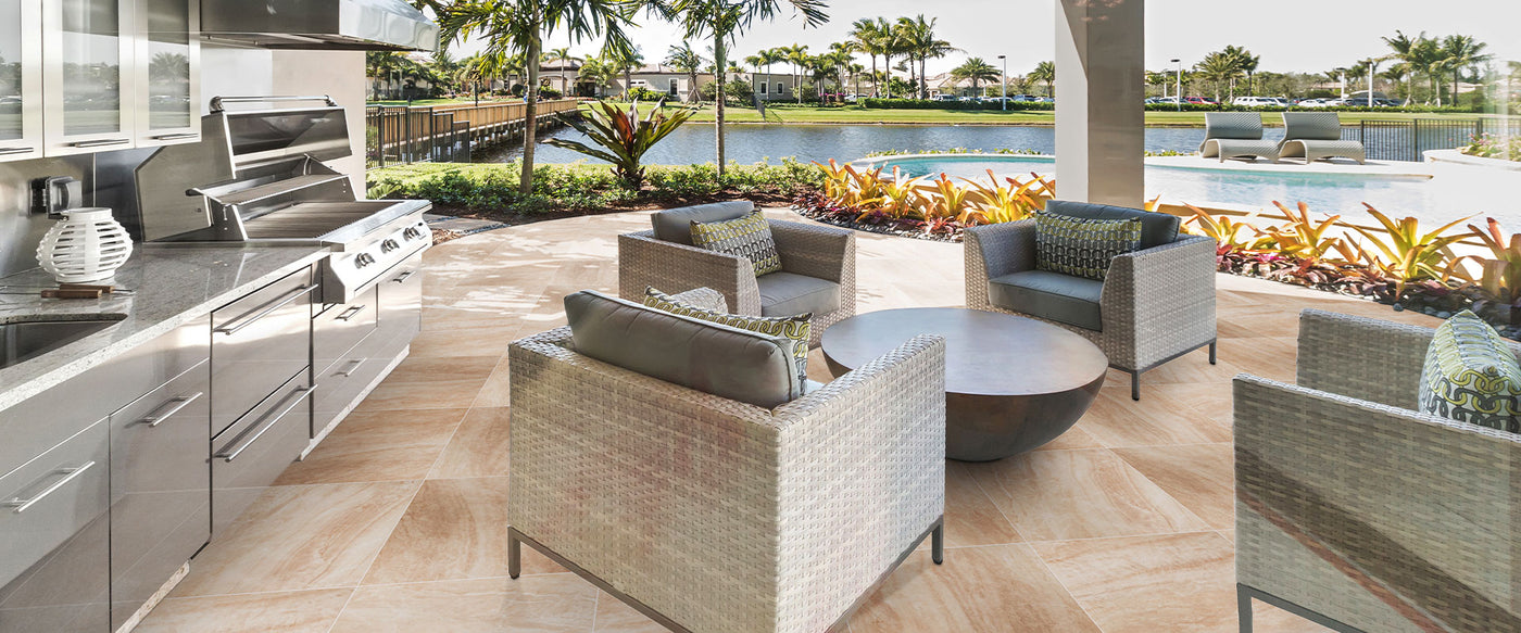 Beige porcelain pavers on outdoor patio with patio furniture