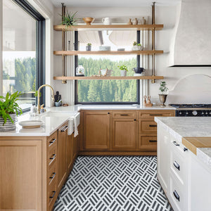 Black and white geometric glass tile on kitchen floor