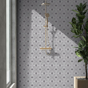 Black and white mid-century modern patterned tile on shower wall