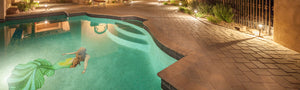 Mermaid swimming pool mosaic installed on bottom of outdoor pool