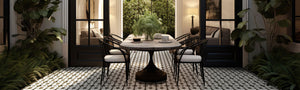 Black and white patterned porcelain tile on patio with outdoor dining furniture