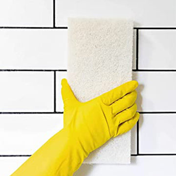 White scrub pad by the tile doctor