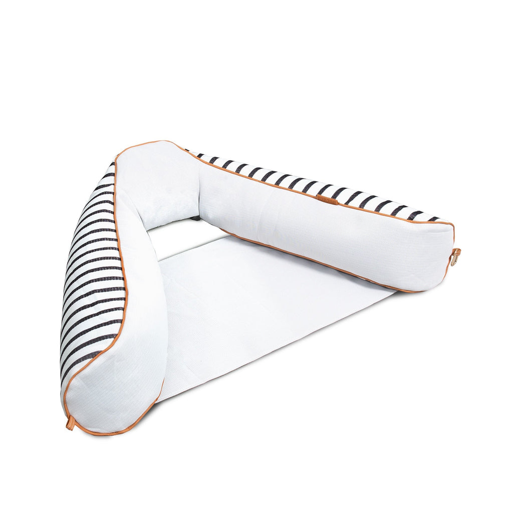 White inflatable pool float with black and white striped top on a white background