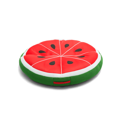 Watermelon slice-shaped cushion on a black background