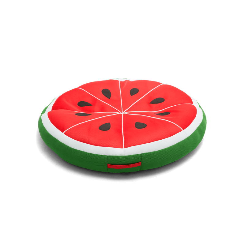 Watermelon slice-shaped cushion on a black background