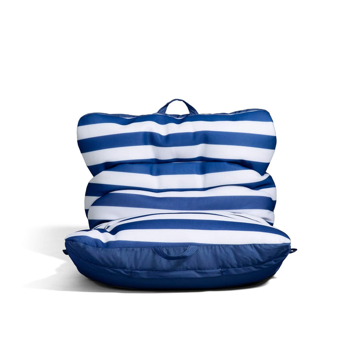 Blue and white striped bean bag chair on a white background