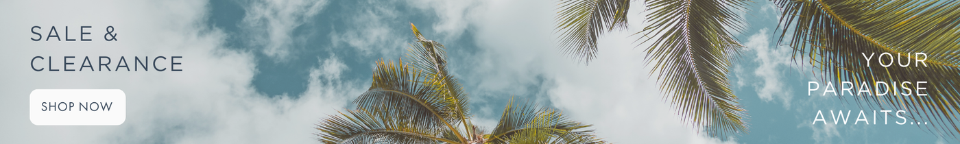Promotional banner with palm trees and 'Your Paradise Awaits' text against a blue sky.
