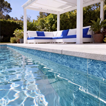 Alps Green, 6" x 24" Porcelain Pool Tile | Pool Waterline Tile with couch and plants