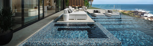 Outdoor swimming pool with in pool chaise loungers