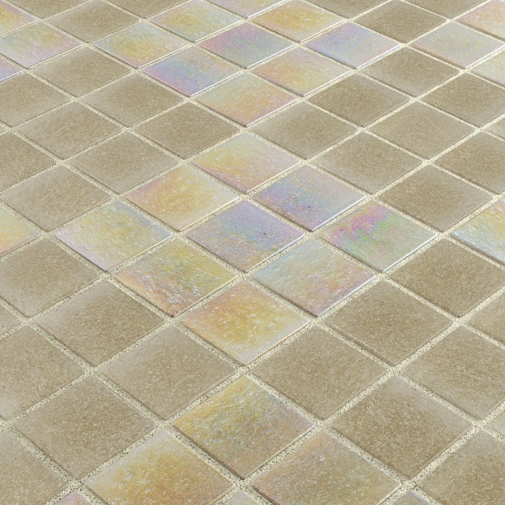 Close-up of iridescent glass mosaic tiles in a grid pattern
