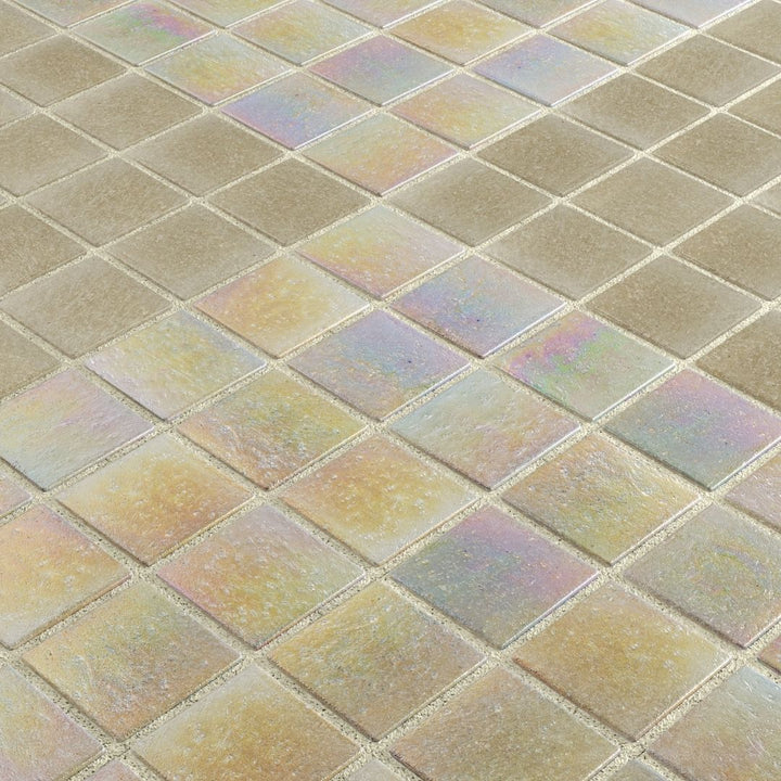Close-up of a tiled floor with square tiles in a grid pattern.