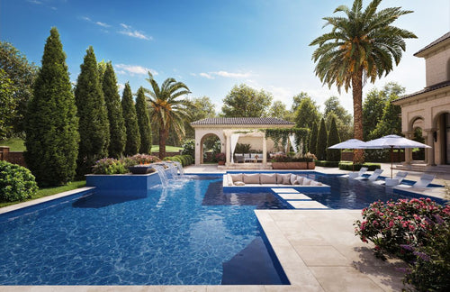 blue glass tile with water features, trees, patio furniture, umbrellas and in pool loungers