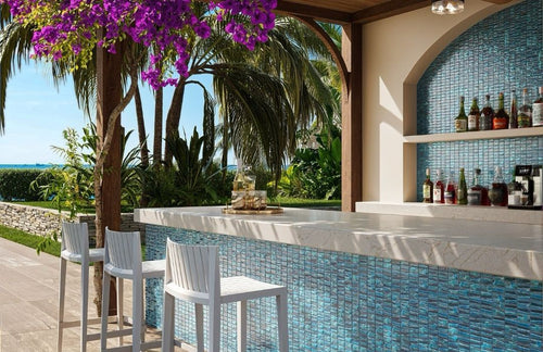 blue mosaic glass tile in outdoor and kitchen and bar area with barstools