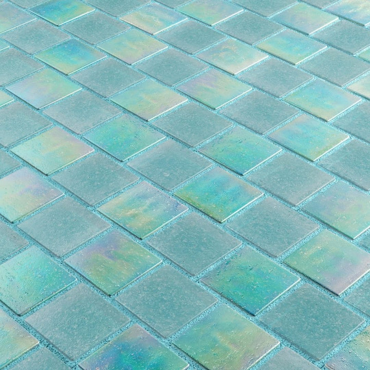 Iridescent glass mosaic tiles arranged in a diamond pattern