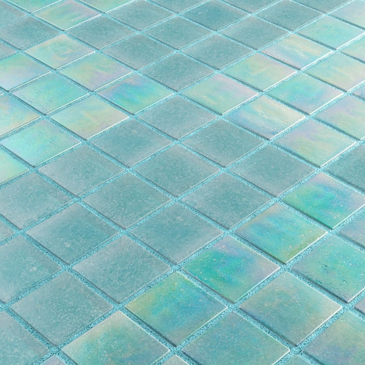 Iridescent glass mosaic tiles arranged in a diamond pattern