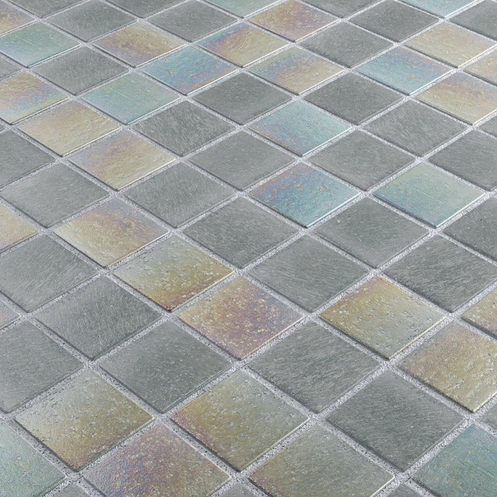 Iridescent glass mosaic tiles arranged in a diamond pattern