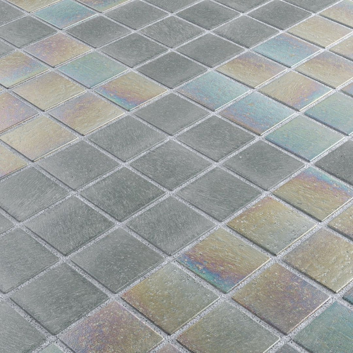 Iridescent glass mosaic tiles arranged in a diamond pattern