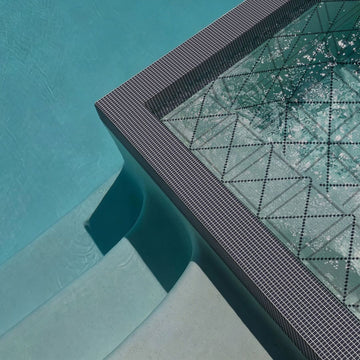 Calvin Haven Glass Mosaic Tile in a hot tub
