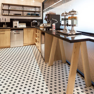 Coco Bond glass mosaic tile with a coffee maker, table, dishwashers and glassware