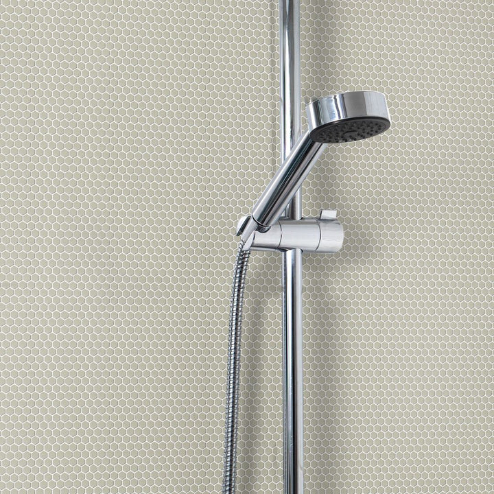 Flaxen Hexagon Glass Mosaic Tile with a shower head