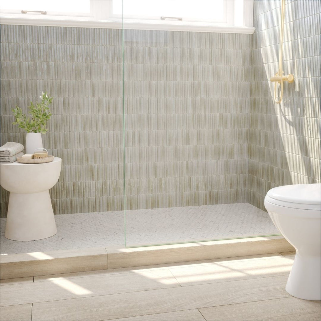 Modern bathroom with tiled walls, a toilet, and a sink.