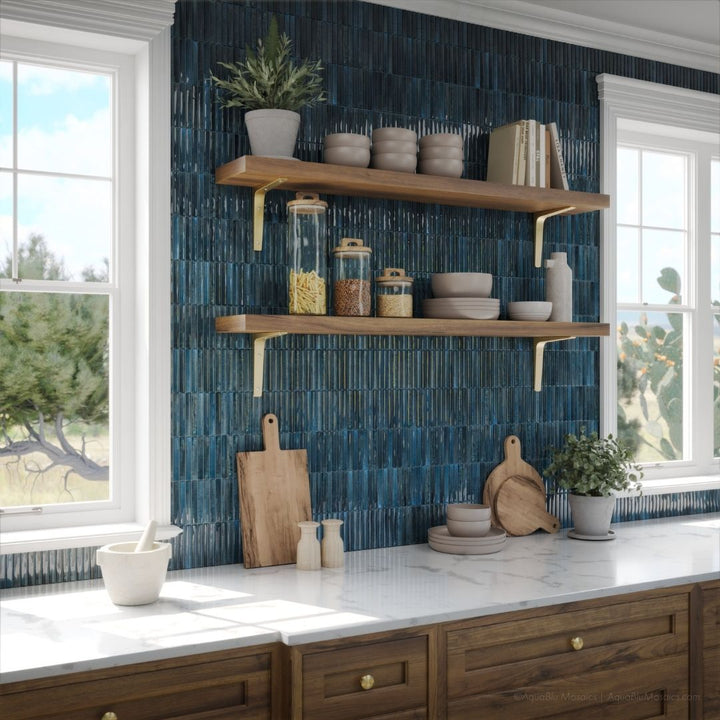 Kitchen with blue tiled wall, wooden shelves, and white countertops.