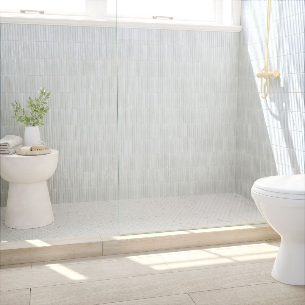 Modern bathroom with white toilet, sink, and decorative elements.