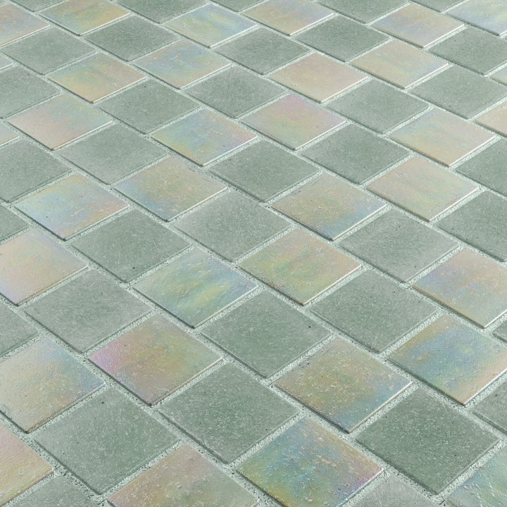 Iridescent glass mosaic tiles arranged in a diamond pattern