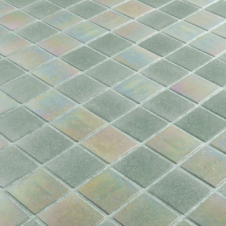 Iridescent glass mosaic tiles arranged in a diamond pattern