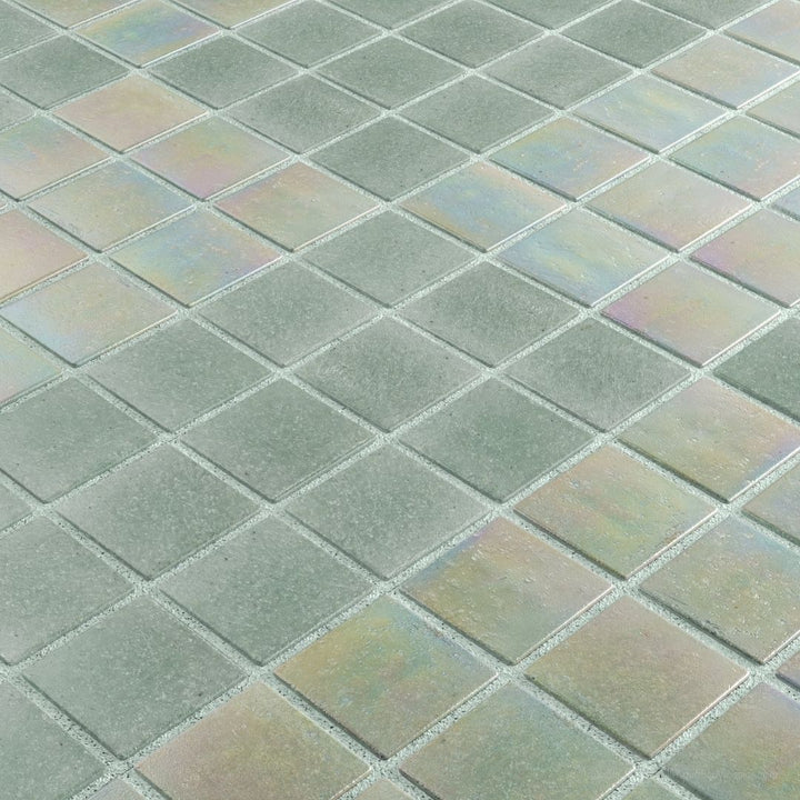 Iridescent glass mosaic tiles arranged in a diamond pattern