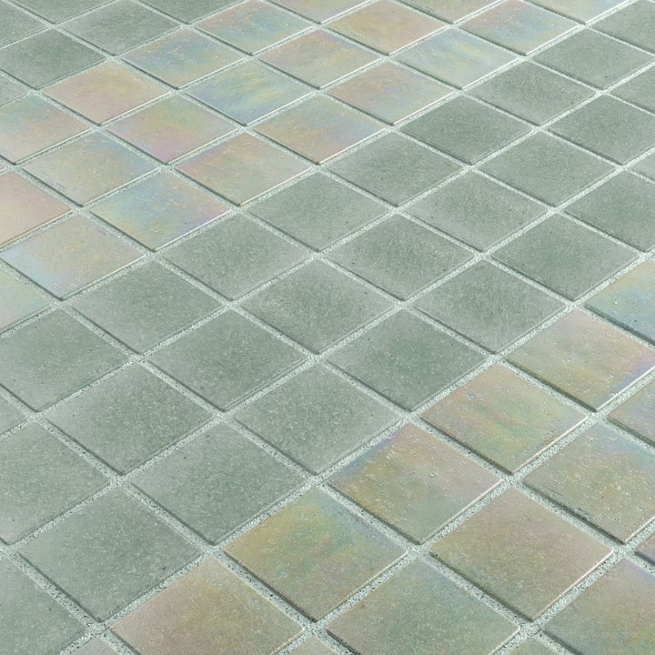 Iridescent glass mosaic tiles arranged in a diamond pattern