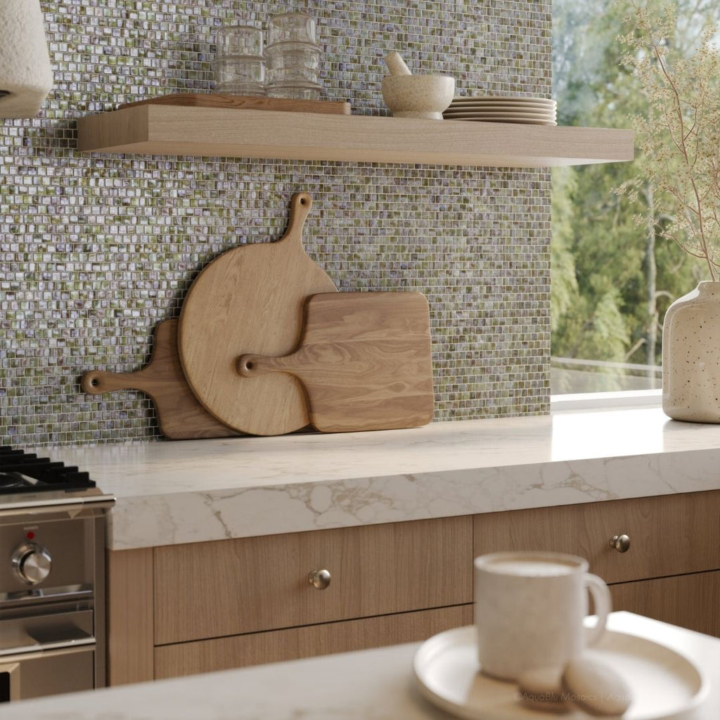 Foxtrot Iridescent, 5/8" x 5/8" Glass Mosaic Tile with a stove, cutting boards, plates and cups