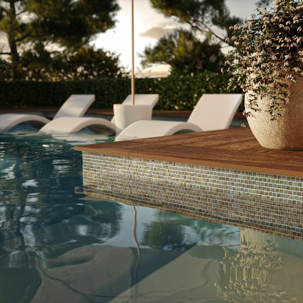 Foxtrot Iridescent, 5/8" x 5/8" Glass Mosaic Tile | Murrine Mosaics with in pool chair, plant and umbrella
