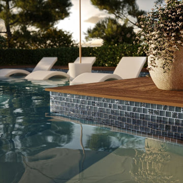 Pastoral Mixed, 1-1/2" x 1-1/2" Glass Pool Tile | Murrine Mosaics with plant, in pool chairs and umbrella