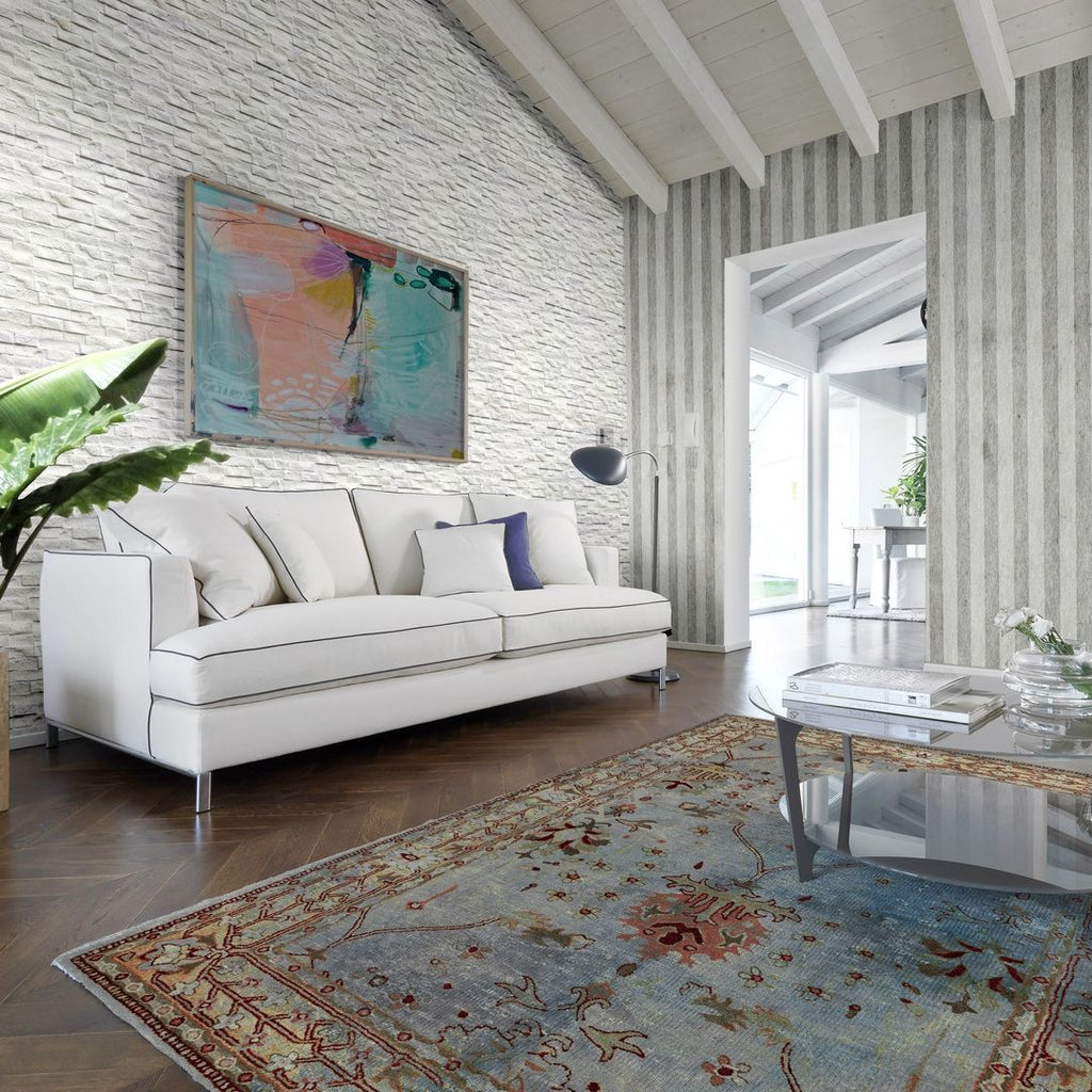 Rock White 3" x 15" Ledgerstone Tile with couch and table with plant