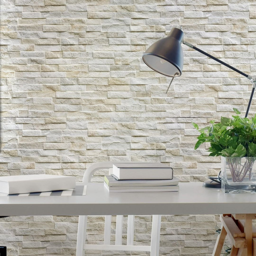 Rock Cream 3" x 15" Ledgerstone Tile with a table, chair and lamp