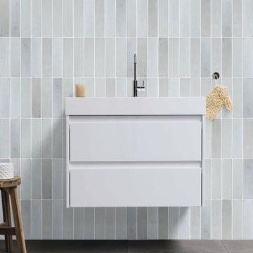 Skyline Sandstone Tumbled Tile with a sink and sponge