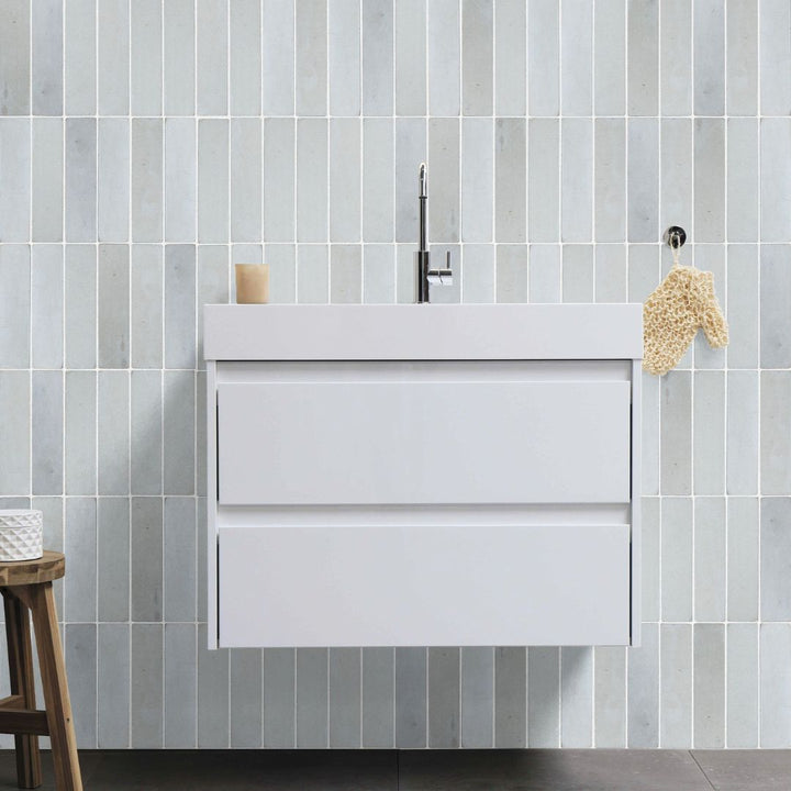 Skyline Sandstone Tumbled Tile with a sink and sponge