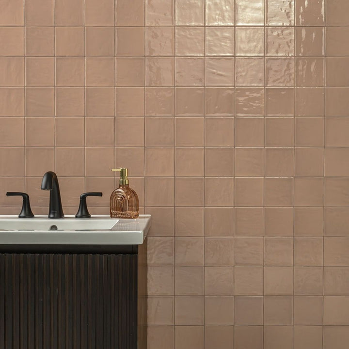 Terranello Cotto 4" x 4" Glossy Ceramic Kitchen & Bathroom Tile with a sink and soap.