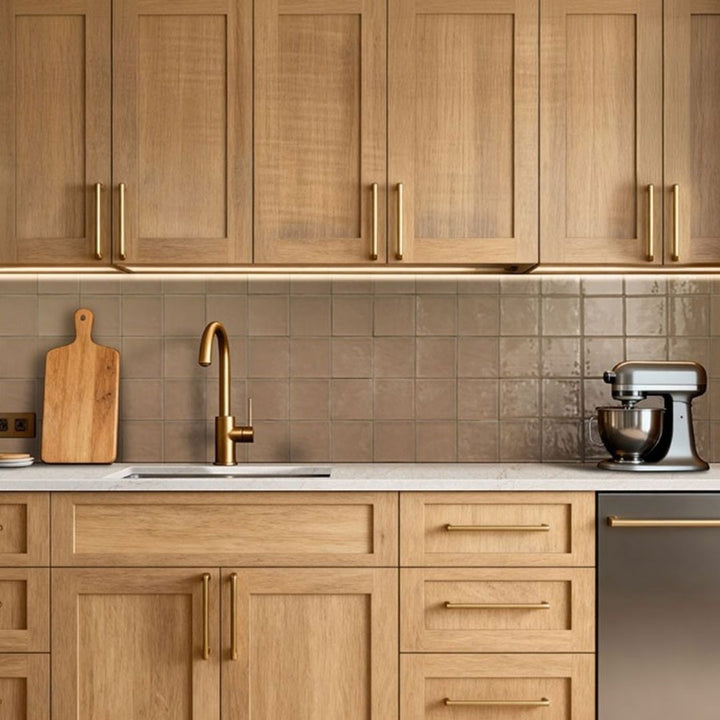 Terranello Cotto 4" x 4" Glossy Ceramic Kitchen Backsplash Tile with a mixer and a sink.