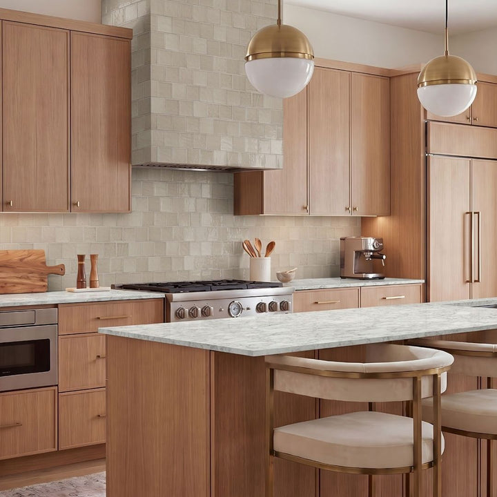 Terranello Dune 4" x 4" Glossy Kitchen Backsplash Tile with utensils, chairs, lamps and stove.