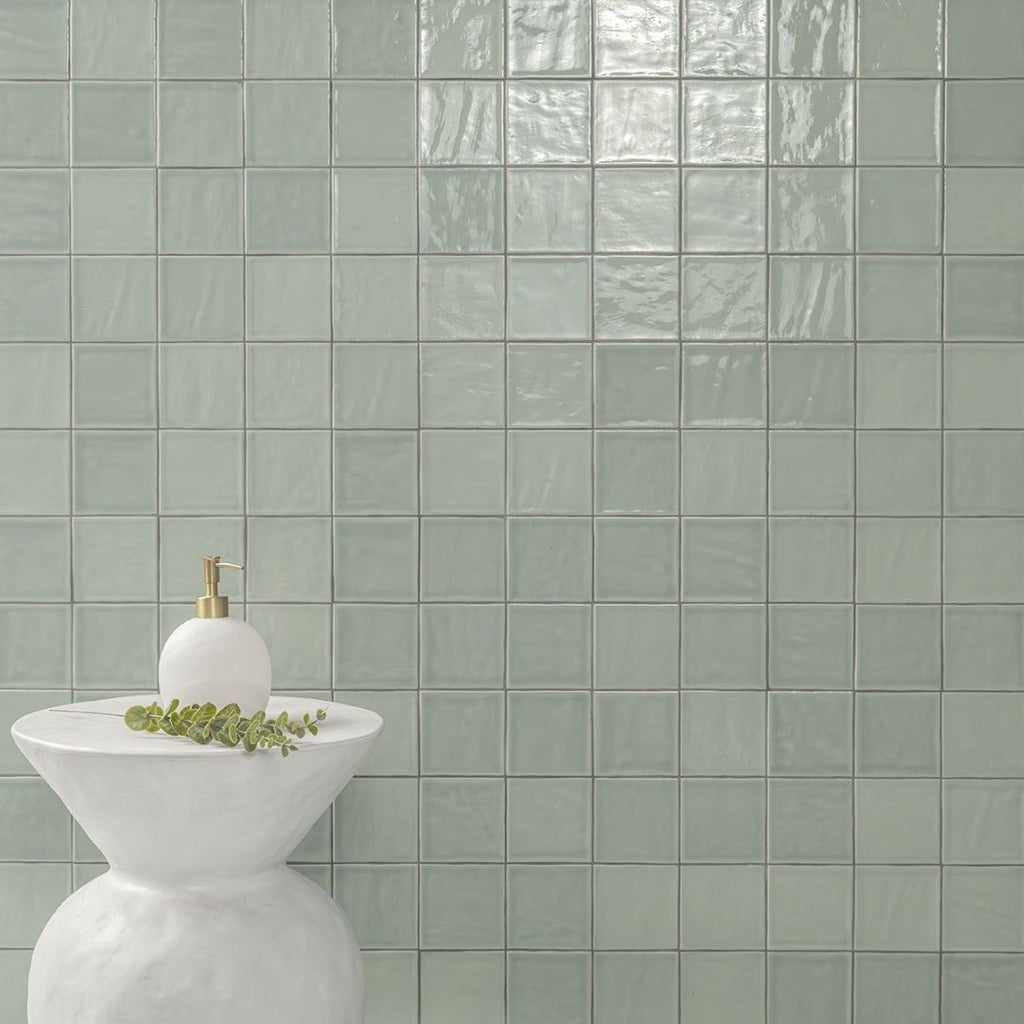 Terranello Olive 4" x 4" Glossy Kitchen & Bathroom Tile with a stool and soap