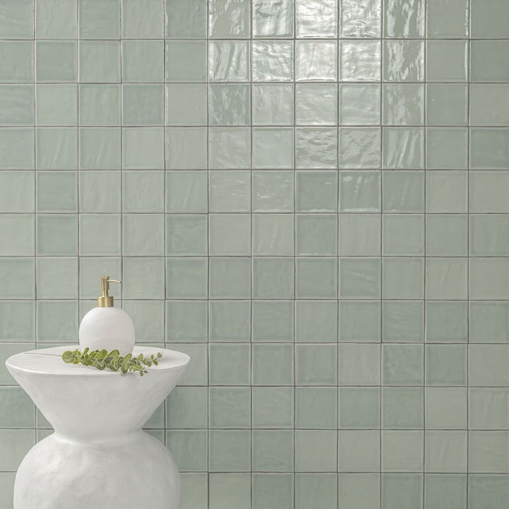 Terranello Olive 4" x 4" Glossy Kitchen & Bathroom Tile with a stool and soap